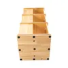 A wooden tiered shelf unit is shown against a white background. Podgląd zdjęcia produktu