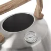 Close-up of a kettle with a thermometer. Voir les images du produit