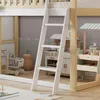 A close-up view of a children's loft bed with a ladder and play area underneath, featuring toy kitchen and market stall. Náhled obrázku produktu