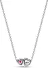 A close-up studio shot of a silver necklace with two heart-shaped pendants. Produktbild-Vorschau