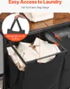 A close-up shot of a laundry basket with a wooden top, highlighting its pull-out fabric bag design and ease of use. Náhľad obrázku produktu