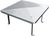 A silver chimney cap with four legs, shown from a diagonal angle against a white background. Náhled obrázku produktu