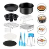 A collection of air fryer accessories arranged on a white background. Voir les images du produit