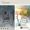 A split image showing a garden furniture set in rain on the left and in sunshine on the right, with feature callouts. Náhled obrázku produktu