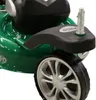 A close-up view of a green lawnmower's wheel and part of its body. Produktbild-Vorschau