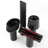 A set of four black vacuum cleaner attachments displayed on a white background. Produktbild-Vorschau