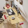 A modern standing desk setup with multiple monitors, a chair, and office accessories. Podgląd zdjęcia produktu