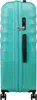 A close-up, front-facing view of a turquoise suitcase with a pixelated pattern. Produktbild-Vorschau