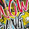 A close-up of a colorful, graphic-style fabric with bold text and comic-book-like elements. Voir les images du produit