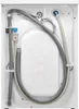 The back of a washing machine showing hoses and connections. Produktbild-Vorschau