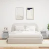 A bedroom scene with a bed and nightstands. Produktbild-Vorschau