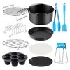 A collection of air fryer accessories laid out on a white background. Voir les images du produit