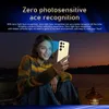 A woman is using a smartphone in a dimly lit outdoor setting. Produktbild-Vorschau