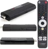 A collage of product shots showing a black Android TV stick and its remote control against a white background. Anteprima dell’immagine prodotto