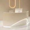 A modern reception desk with a curved design and integrated lighting. Produktbild-Vorschau