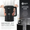 A person is holding a black electric kettle with a digital display, showcasing its features and design. Produktbild-Vorschau