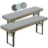 Two grey bench cushions are shown on a white background, with three circular fabric swatches in different shades of grey and blue displayed above them. Voir les images du produit