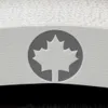 A close-up of a white cat tree with a maple leaf logo. Produktbild-Vorschau