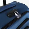 A close-up view of a blue fabric suitcase with a combination lock and zipper pull. Produktbild-Vorschau