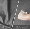 A split image showing the waterproof and easy-to-wipe-off features of a pet sofa. Voir les images du produit