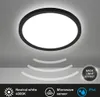 A circular LED ceiling light with a black frame is shown against a light gray background. Wave-like lines emanate from below the light, suggesting motion detection. Icons and text describing features are present at the bottom. Produktbild-Vorschau
