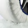 A close-up view of a snow sock on a tire, surrounded by ice. Náhled obrázku produktu