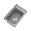 A top-down, angled view of a gray sink basin with a drain and a ribbed drying area. Náhľad obrázku produktu