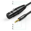 A close-up shot of an audio cable with XLR and 3.5mm jack connectors. Anteprima dell’immagine prodotto