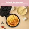 A waffle maker with a freshly baked waffle, batter, and berries on a light-colored surface. Náhľad obrázku produktu
