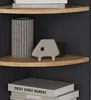 Decorative items on a corner shelf. Voir les images du produit