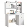 A white computer desk with shelves and drawers, featuring a laptop, books, and decorative items. Produktbild-Vorschau