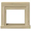 A front view of a wooden fireplace surround. Voir les images du produit