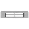 A front view of a gray TV stand with glass shelves, isolated on a white background. Náhled obrázku produktu