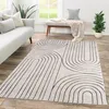 A living room scene with a sofa, rug, and bench. Produktbild-Vorschau