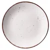 A top-down view of a speckled white plate with a brown rim. Náhled obrázku produktu