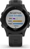 A close-up, front-facing view of a black Garmin Forerunner 955 smartwatch with its screen displaying training load information. Náhled obrázku produktu