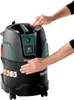 A person's hands are shown interacting with a Metabo vacuum cleaner. Náhled obrázku produktu