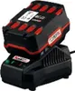 A black and red battery charger with a battery pack on top. Produktbild-Vorschau