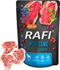 A bag of dog food with raw lamb chops next to it. Podgląd zdjęcia produktu