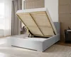 A bed with its storage compartment open, showing the wooden slats and internal space. Produktbild-Vorschau