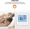 A family sleeping in bed next to a thermostat displaying temperature and time. Podgląd zdjęcia produktu