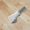 A vacuum cleaner attachment on a wooden floor. Produktbild-Vorschau