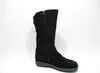A black suede boot is shown against a white background. Anteprima dell’immagine prodotto