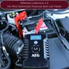 A car battery charger connected to a car battery in an engine bay. Produktbild-Vorschau