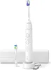 A white electric toothbrush and its accessories are displayed against a white background. Produktbild-Vorschau