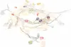 A string of LED lights with decorative elements. Produktbild-Vorschau