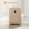 A beige-colored COSTWAY towel warmer is shown in a room with a tiled floor and a white baseboard. Dimensions are indicated with lines and text. Anteprima dell’immagine prodotto