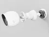 An exploded view of a white security camera and its mounting hardware against a light gray background. Produktbild-Vorschau
