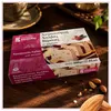 Kandylas Halva mit Mandeln 200 g mit Kaffeetasse auf Holz Produktbild-Vorschau