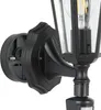A close-up view of the mounting bracket and part of a black outdoor light fixture. Náhľad obrázku produktu